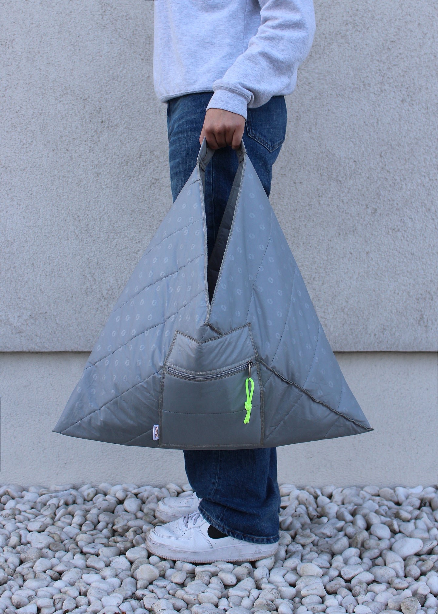 Grey medium quilted Triangle bag with flouro trim